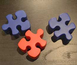 Image of three large jigsaw pieces