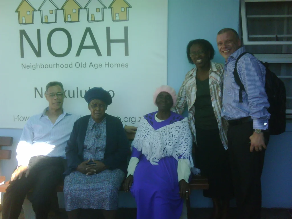 Mike and four people at the NOAH organisation in South Africa